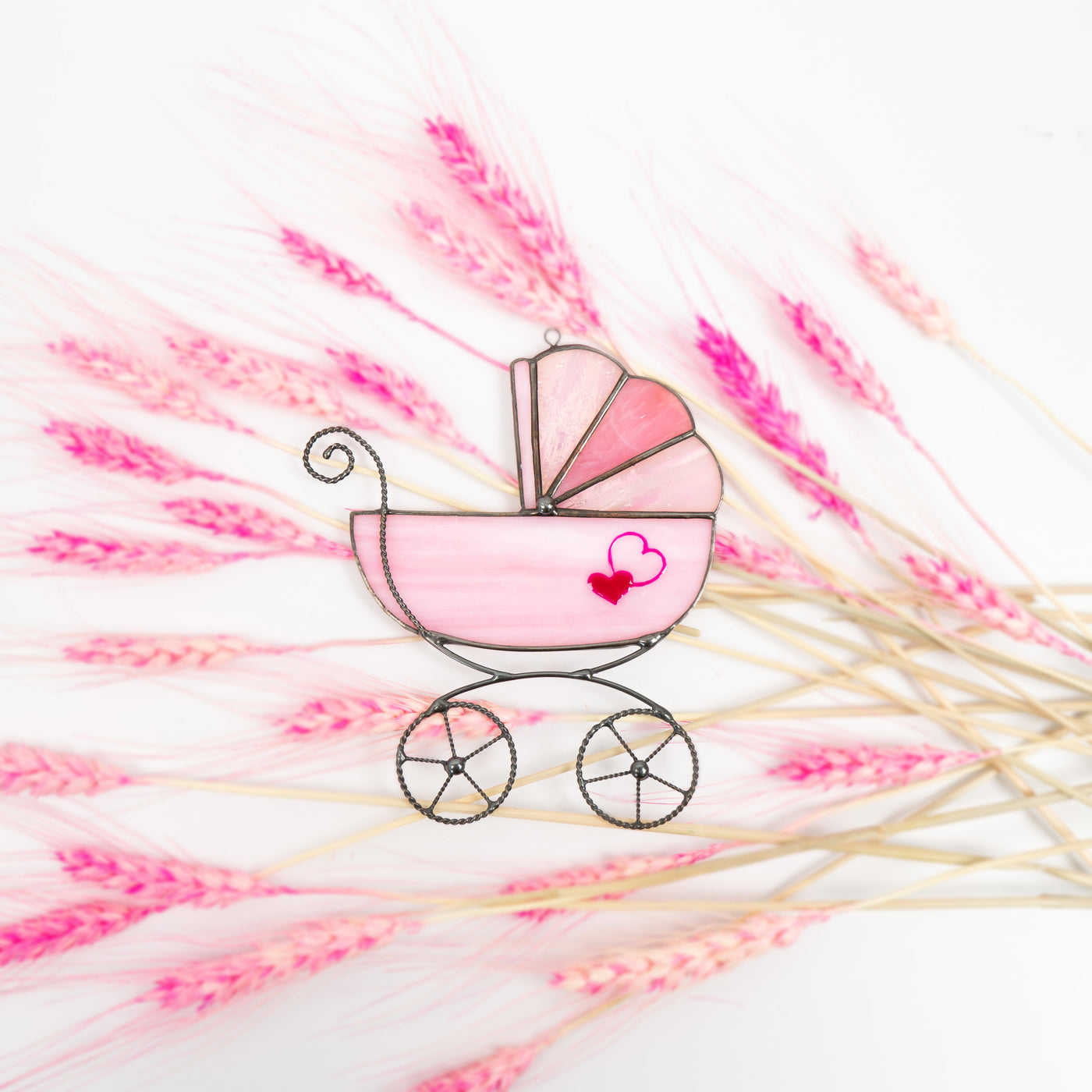 Stained glass pink baby stroller with two red hearts suncatcher