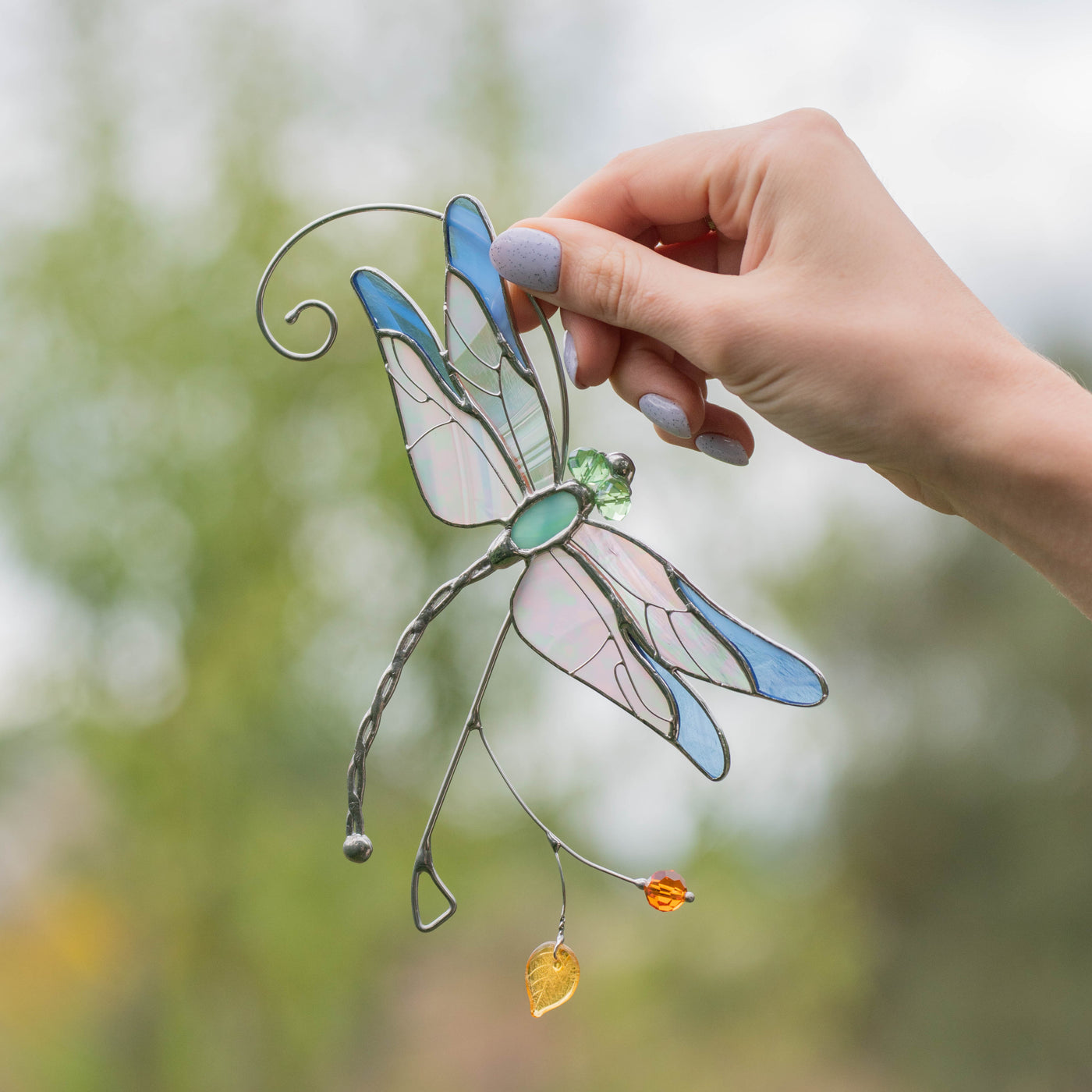 Stained glass blue dragonfly window hanging