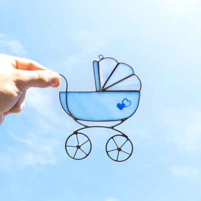 Zoomed stained glass blue baby stroller suncatcher
