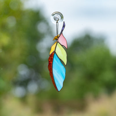 Colourful stained glass feather window hanging 