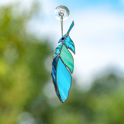 Stained glass aquamarine feather window hanging