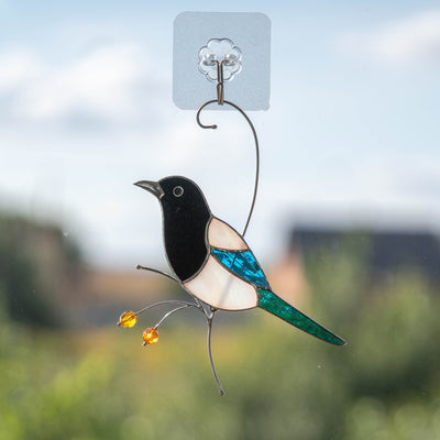 Stained glass side view magpie looking left suncatcher