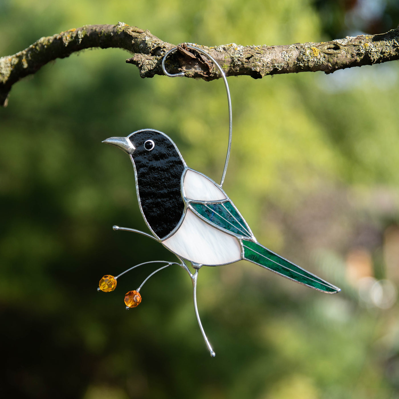 Zoomed stained glass magpie window hanging