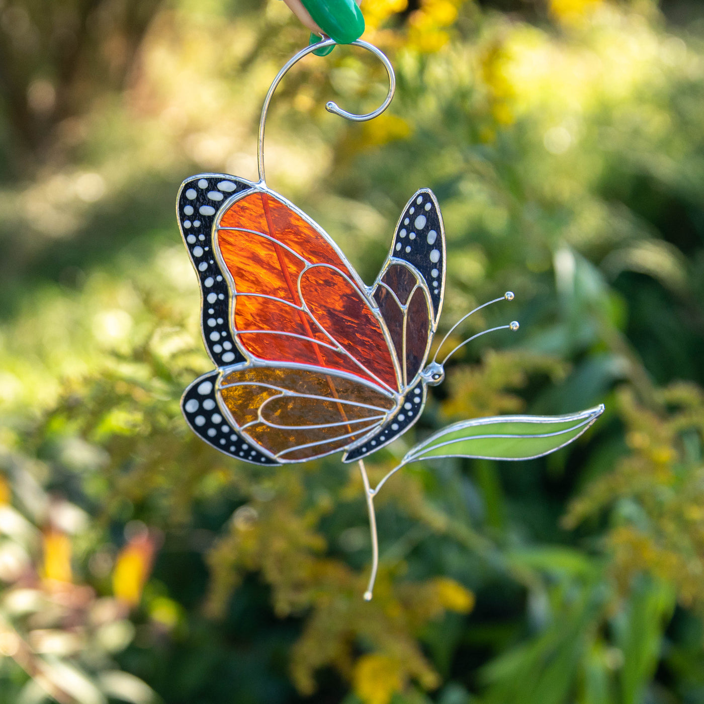 Stained glass suncatcher of monarch butterfly 