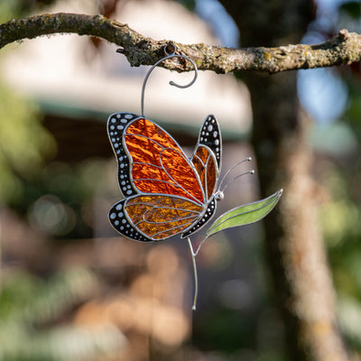 Bright stained glass monarch butterfly suncatcher
