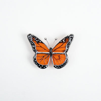 Zoomed stained glass monarch butterfly top-view brooch