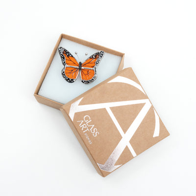 Stained glass top-view monarch butterfly brooch in a brand box