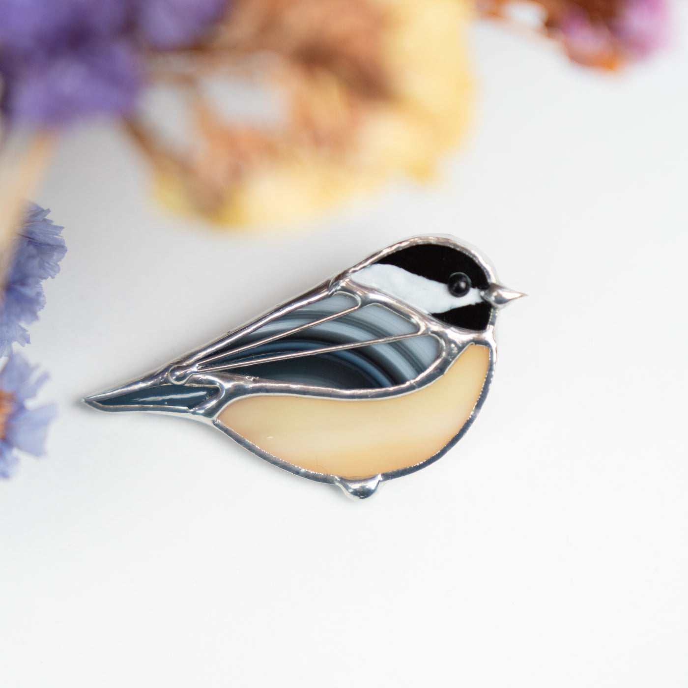 Zoomed stained glass yellow chickadee pin