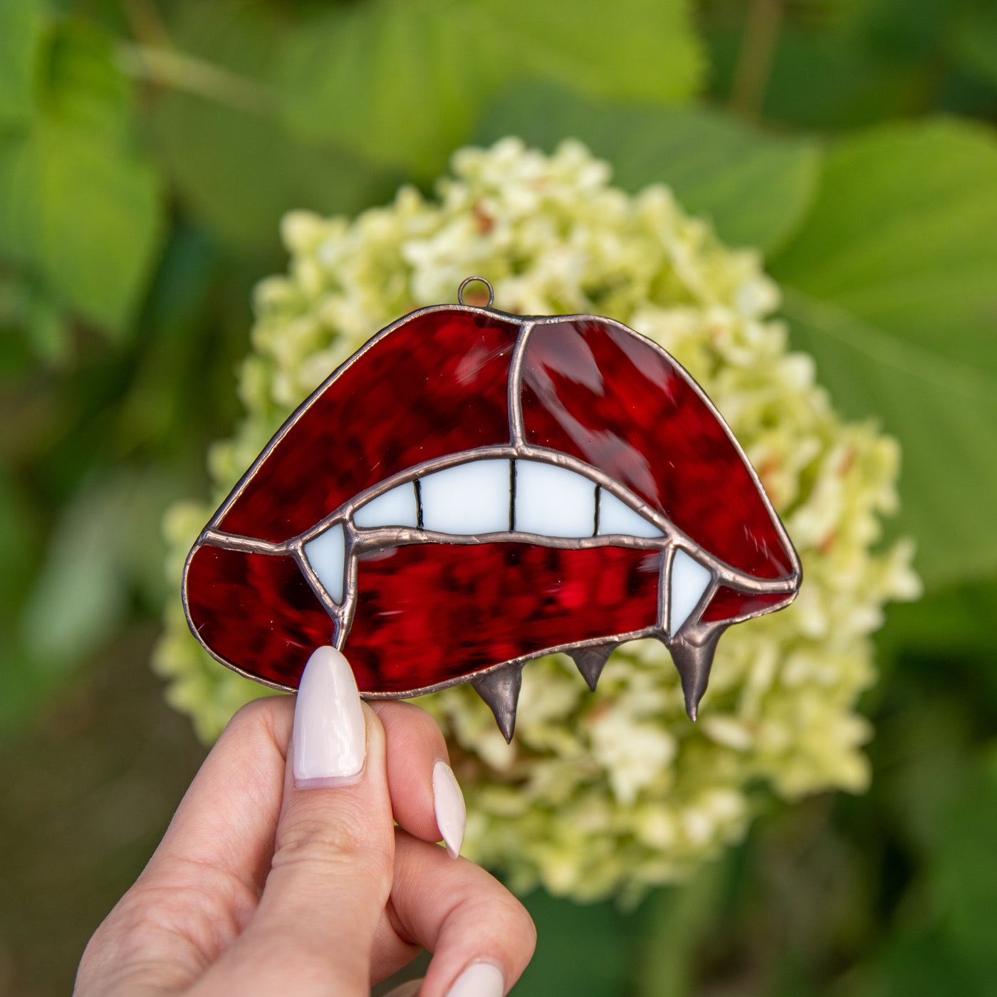 Stained glass vamp lips and teeth window hanging 