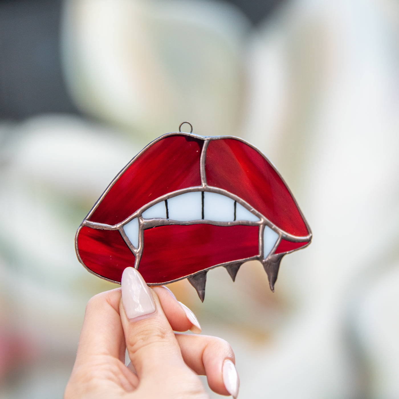 Stained glass vampire teeth on red lips suncatcher for Halloween