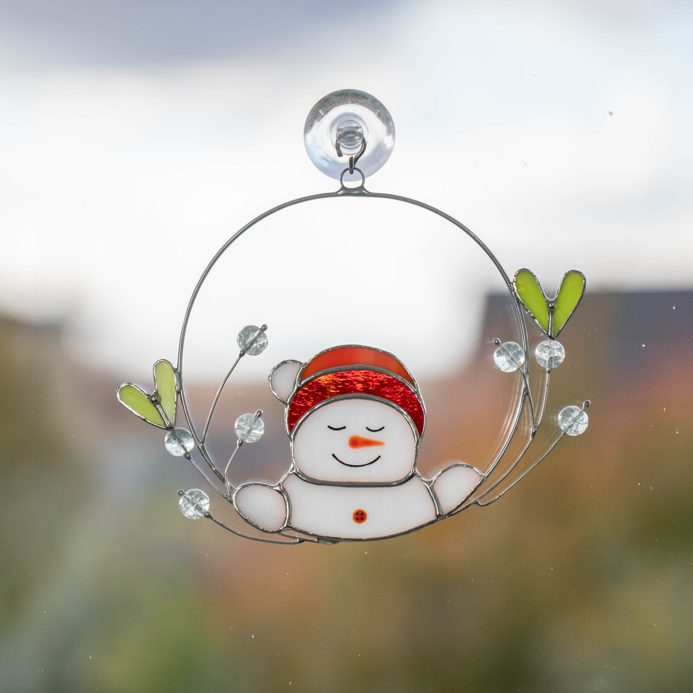 Snowman in mistletoe suncatcher of stained glass