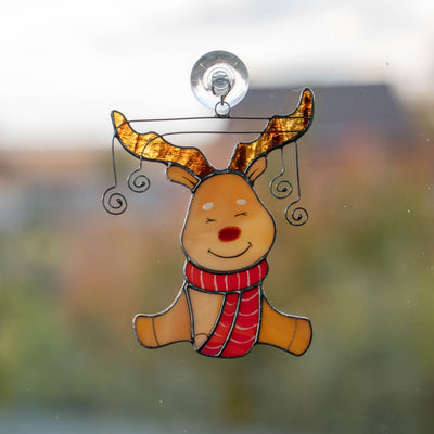 Rudolph reindeer in red scarf suncatcher of stained glass