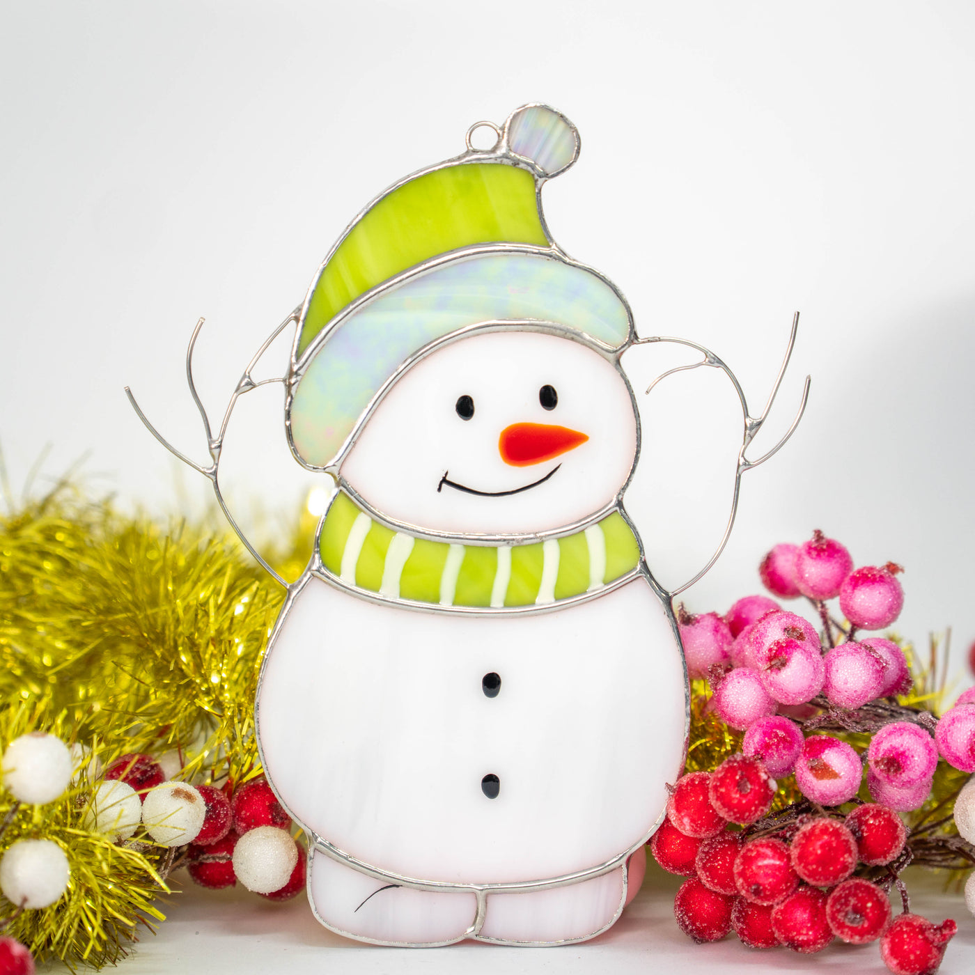 Stained glass snowman in green hat suncatcher for Christmas decor