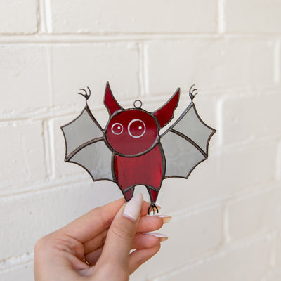 Suncatcher of stained glass Halloween red bat