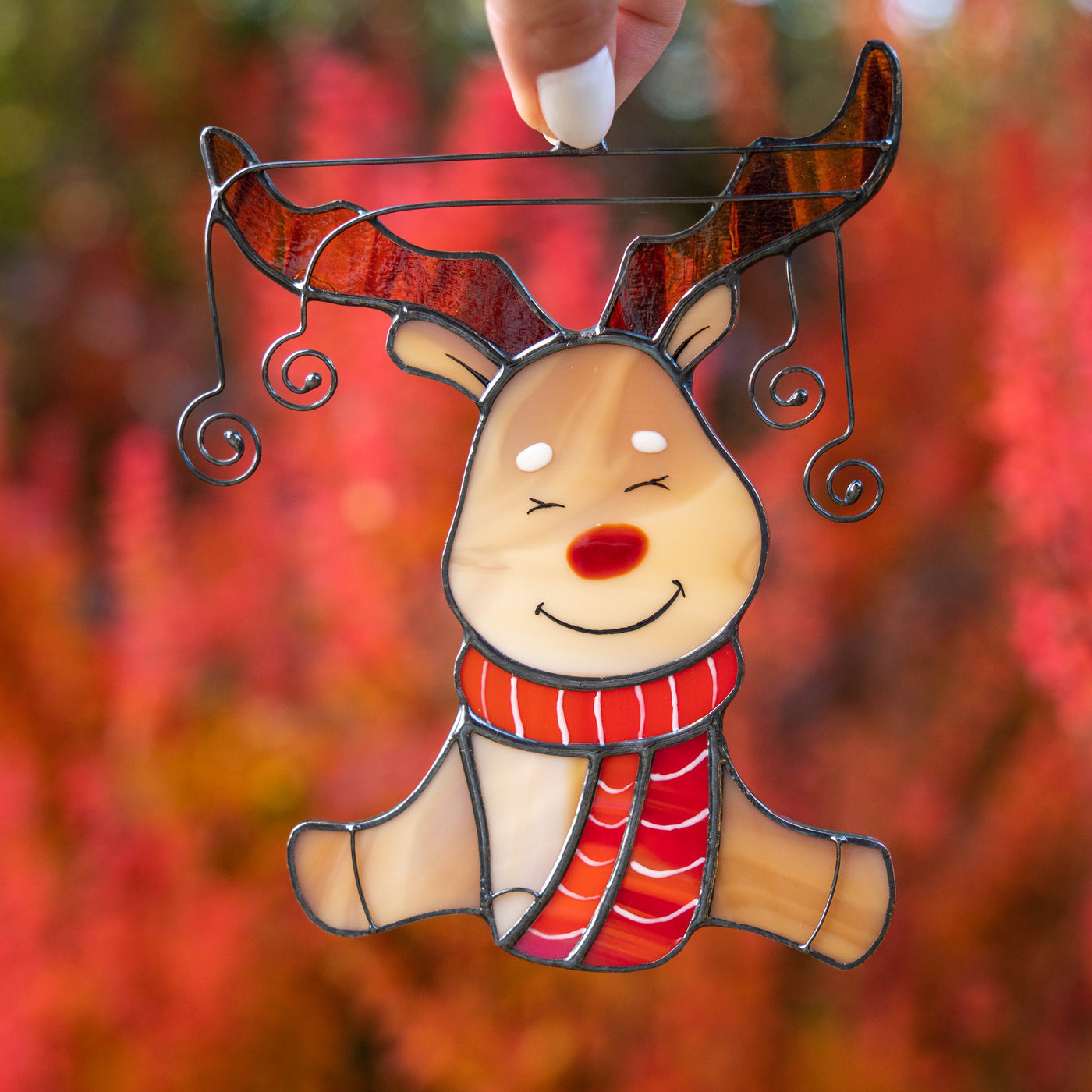 Rudolph reindeer in red scarf suncatcher of stained glass for Christmas decor