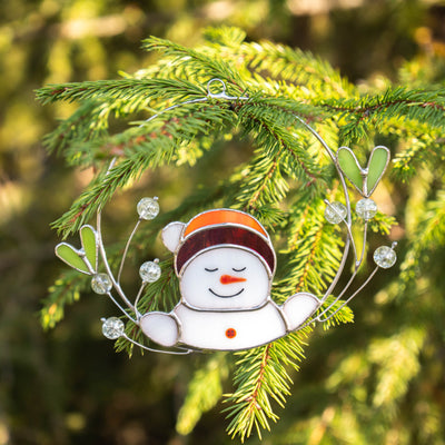 Stained glass snowman in mistletoe suncatcher for Christmas