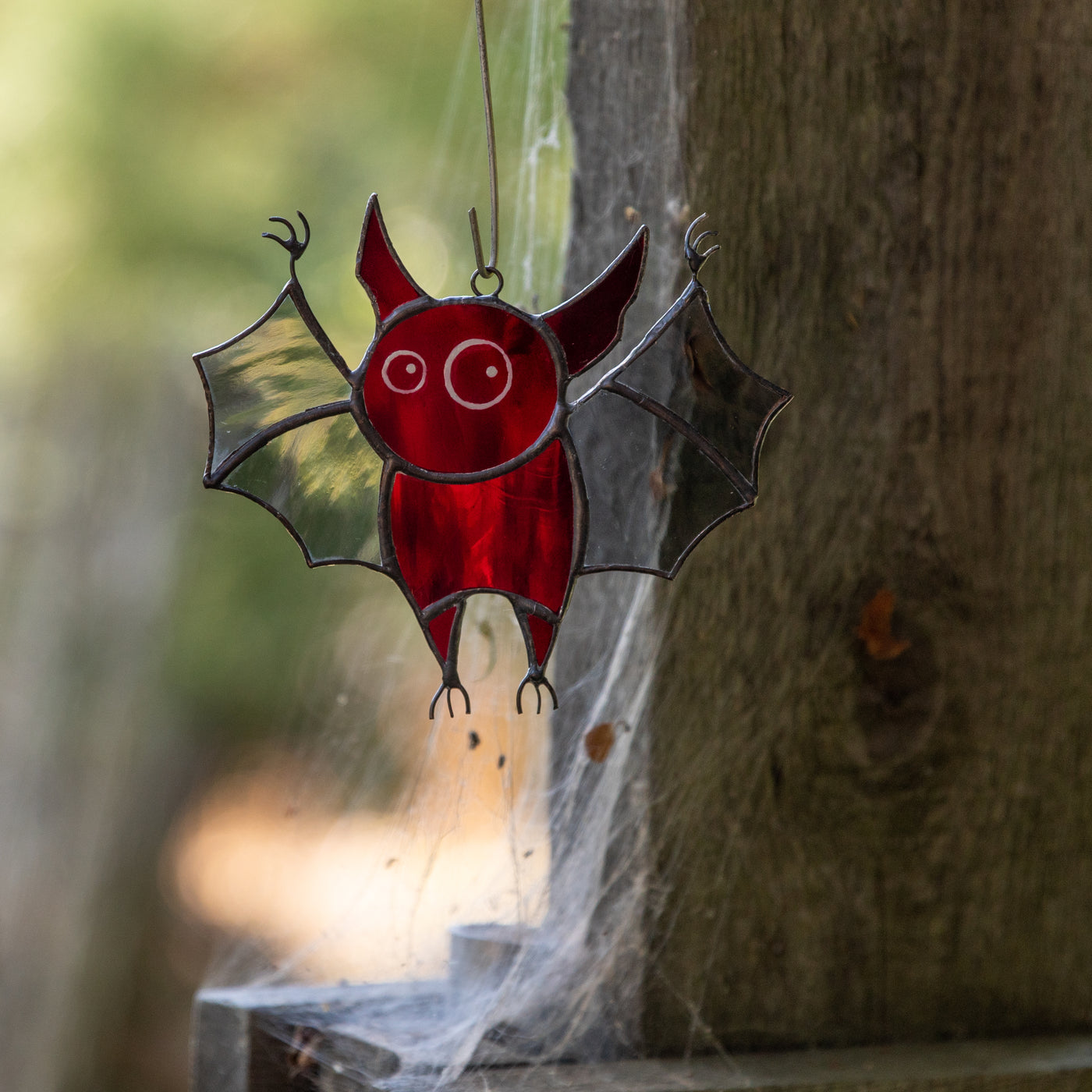 Spooky stained glass red bat for Halloween decor