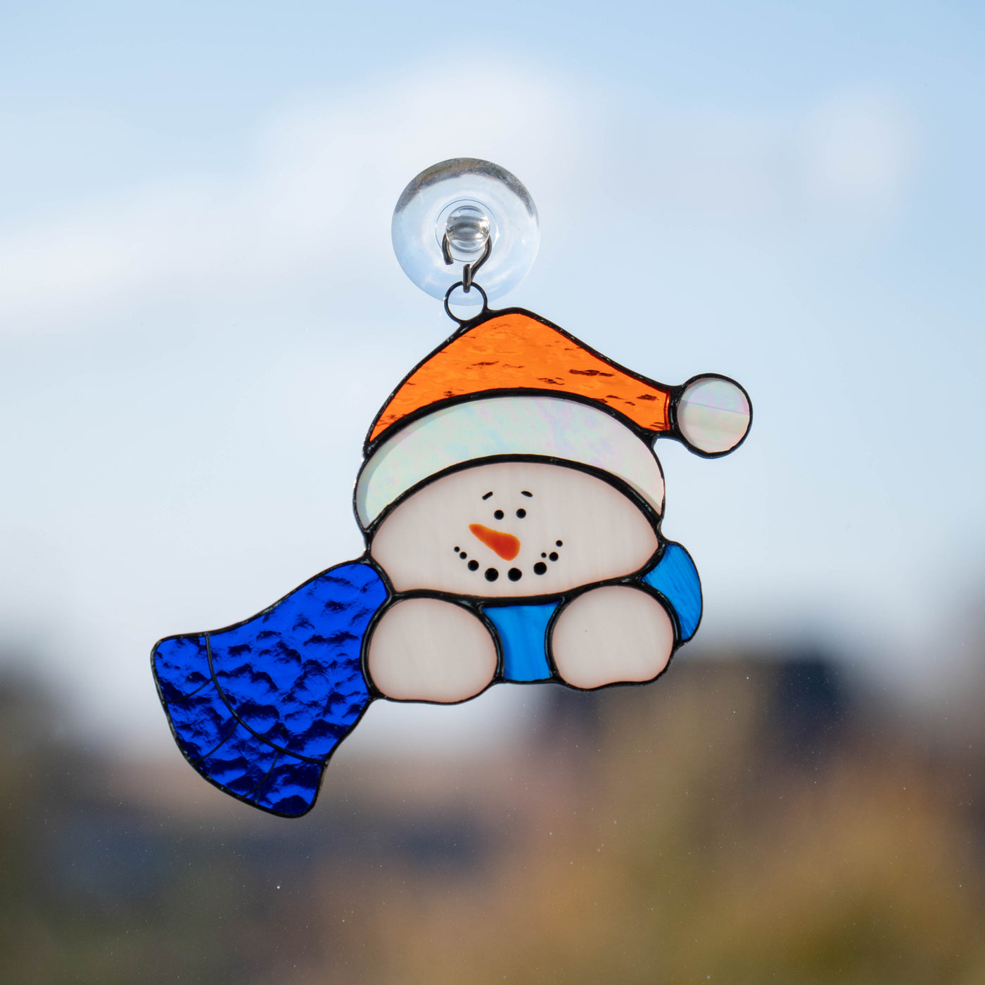 Snowman in blue scarf suncatcher of stained glass