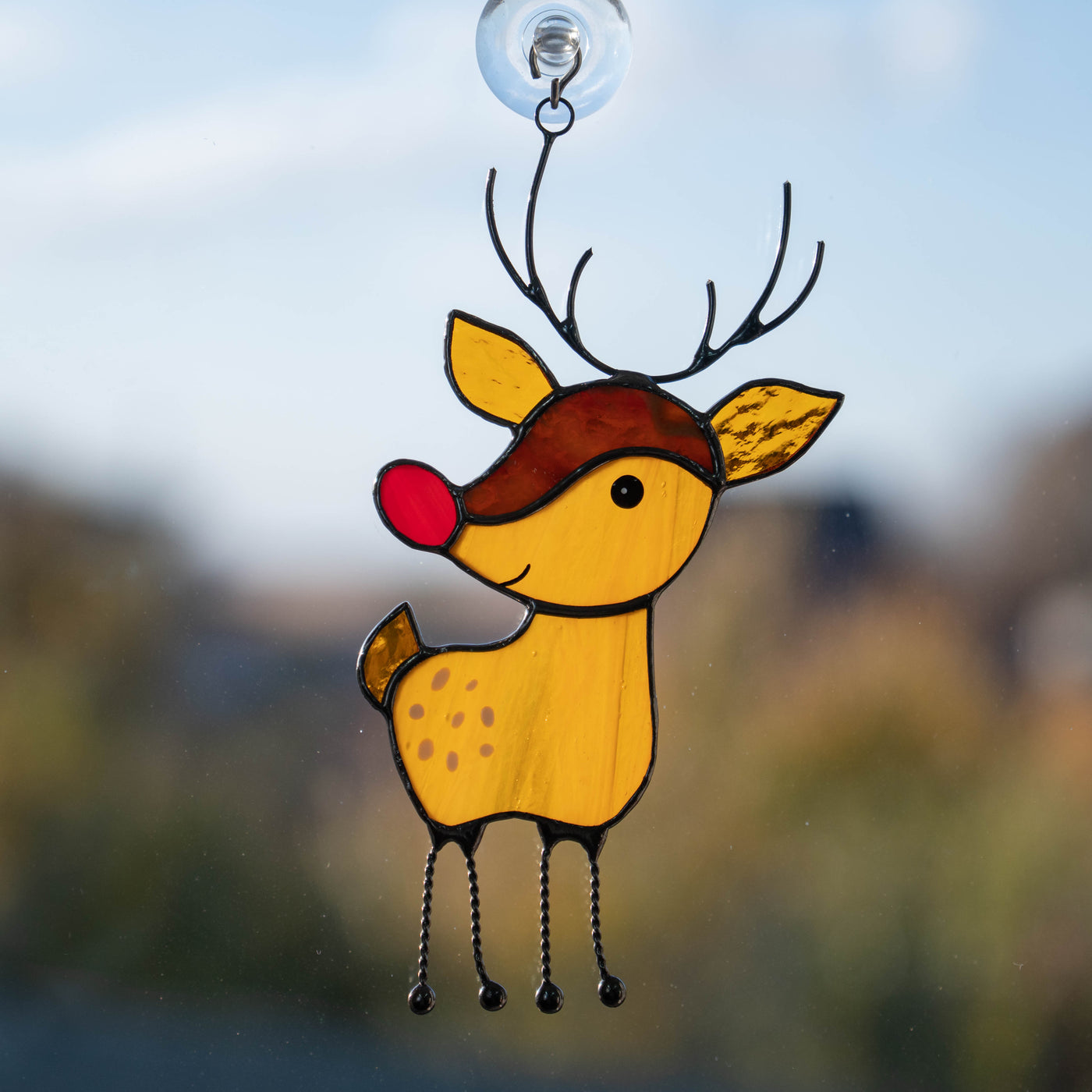 Stained glass reindeer suncatcher for New Year celebrations
