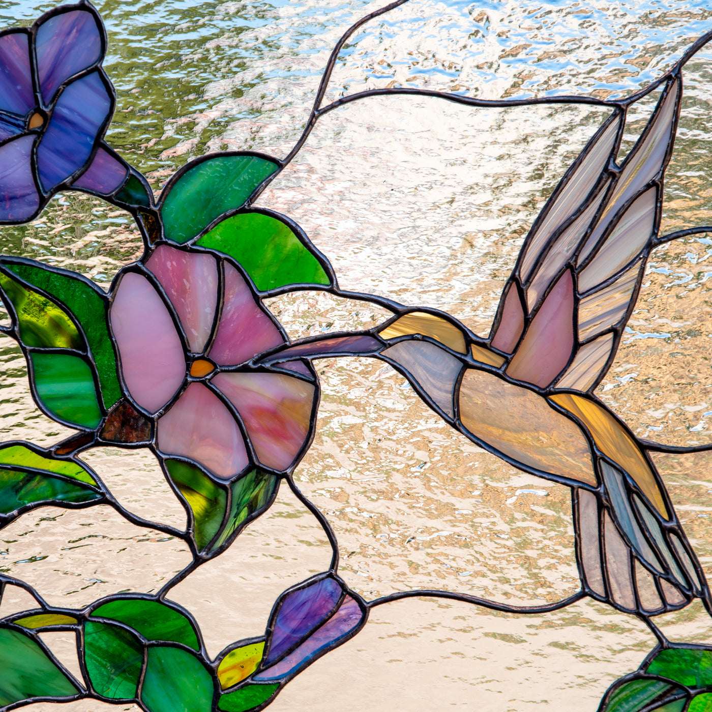 Zoomed stained glass hummingbird panel