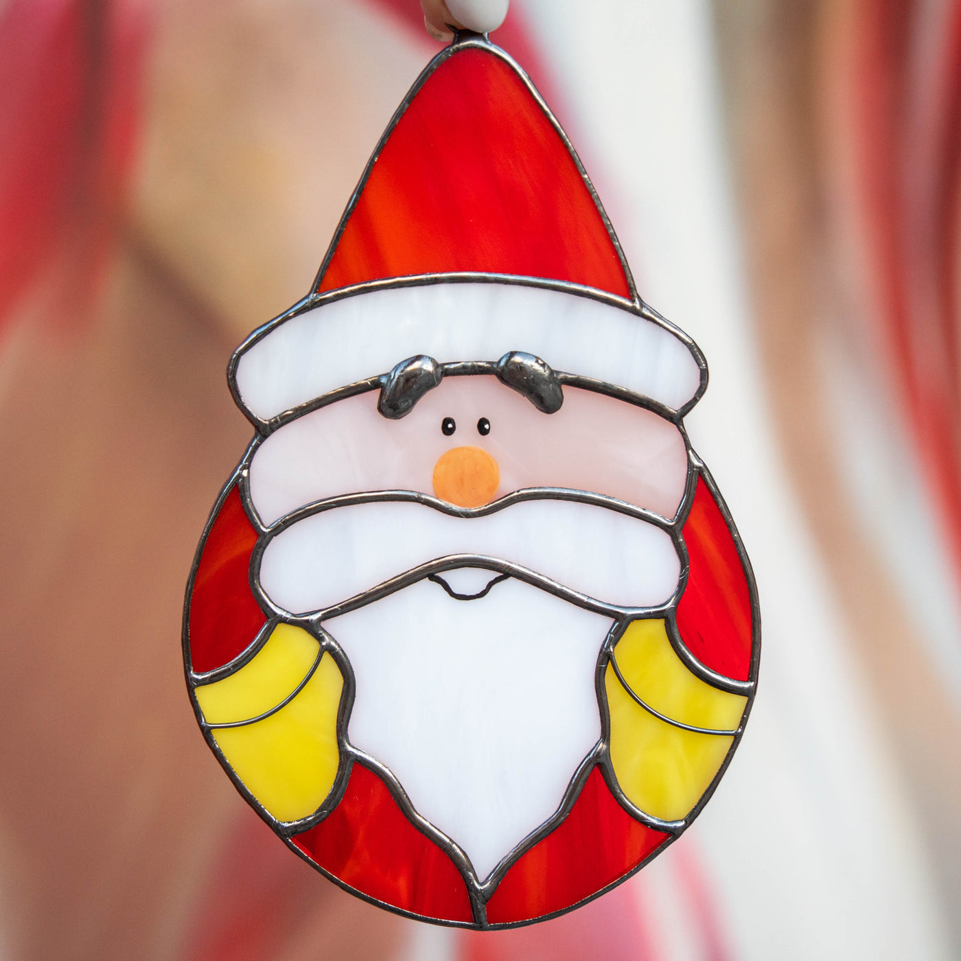 Zoomed stained glass oval Santa Claus suncatcher