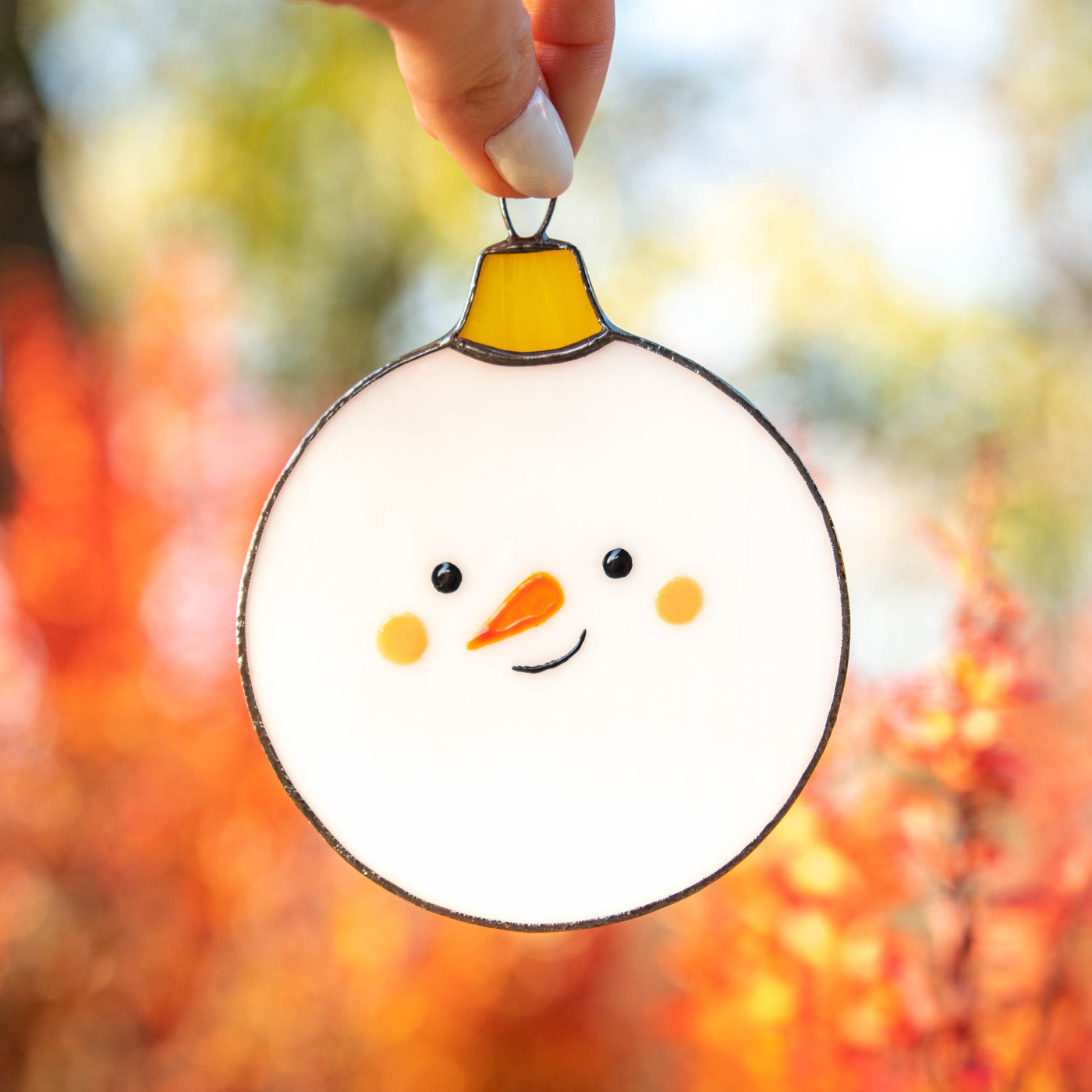 Stained glass round snowman suncatcher for Christmas celebration
