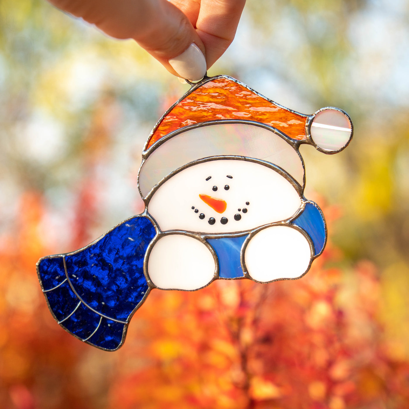Stained glass snowman in blue scarf suncatcher 