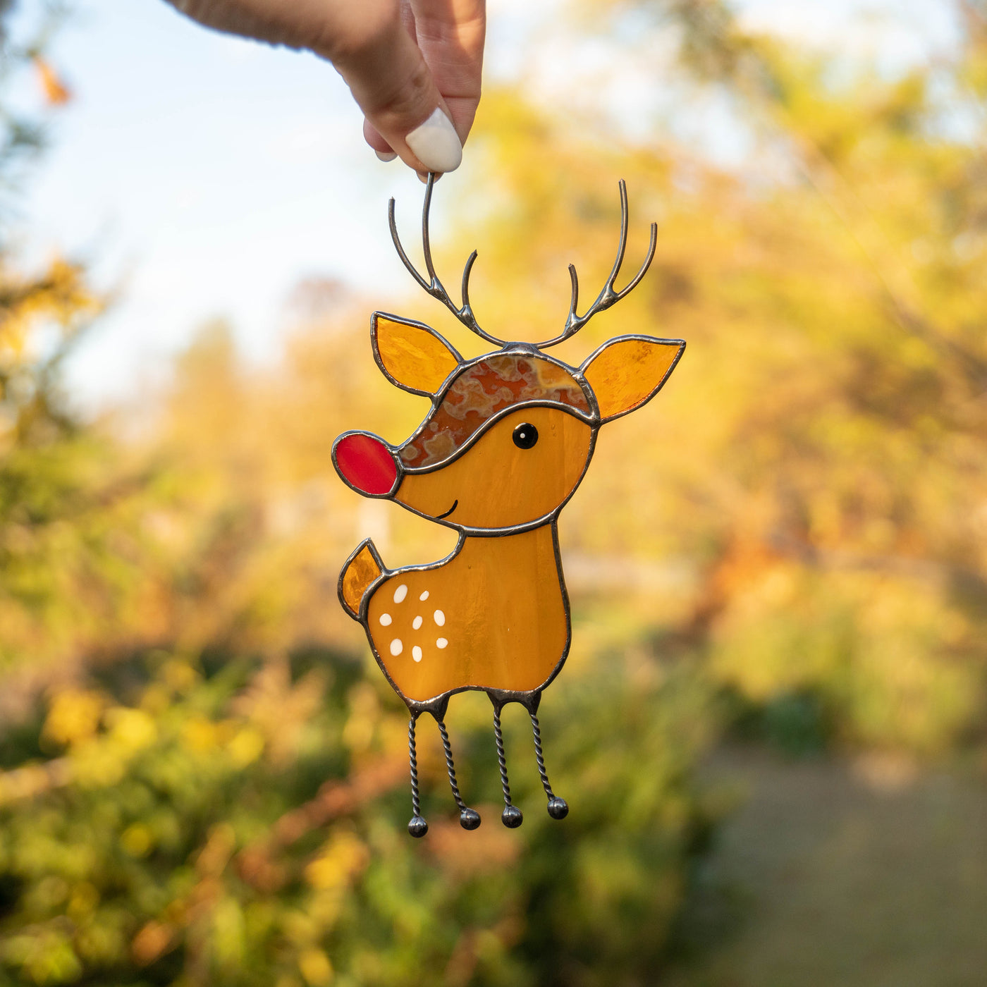 Bright stained glass Christmas reindeer suncatcher 