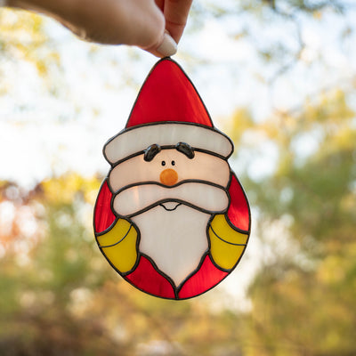 Santa Claus Suncatcher of stained glass for Christmas celebrations