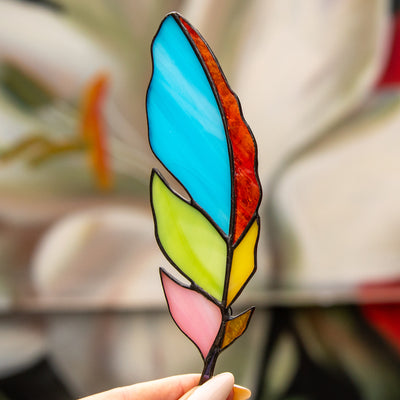 Stained glass feather suncatcher of different colours