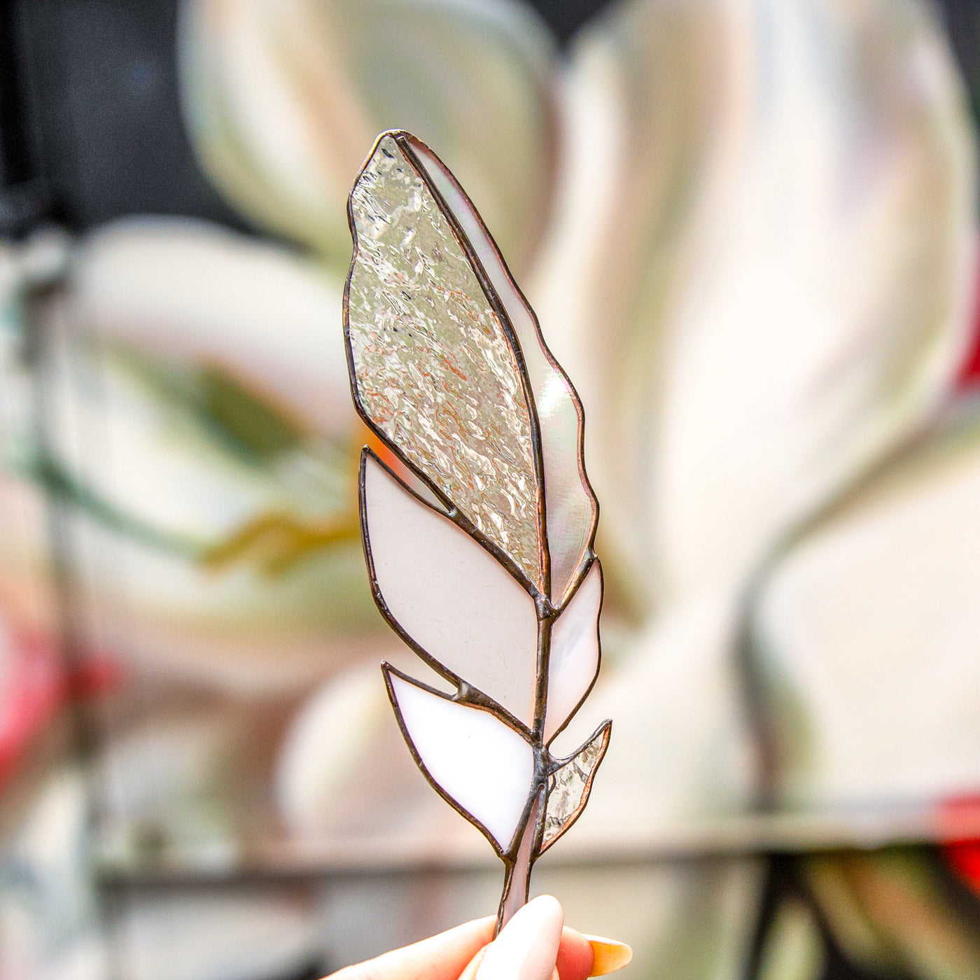 Stained glass white feather with clear parts suncatcher