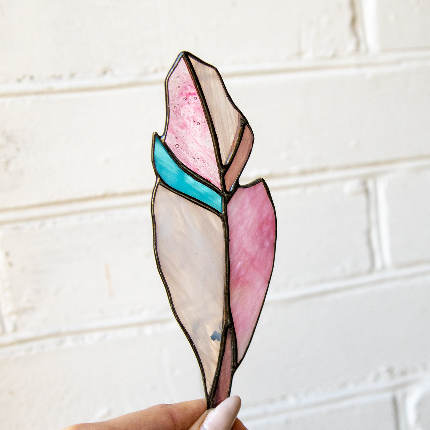 Stained glass pink and its shades feather suncatcher for window