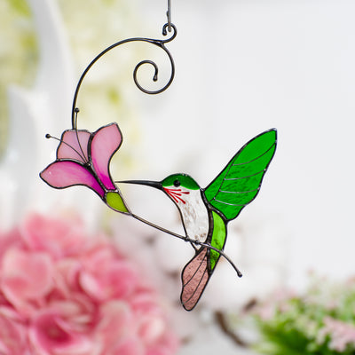 Stained glass hummingbird with the purple flower suncatcher