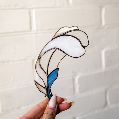 White-blue feather suncatcher of stained glass for window decor