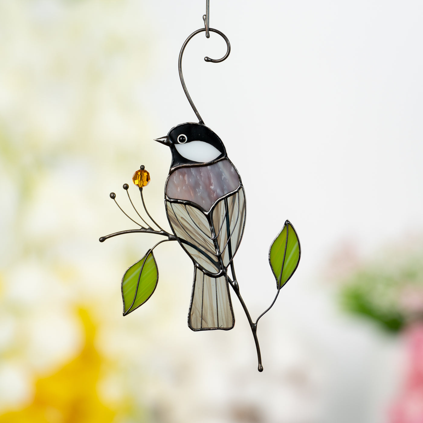 Back-view stained glass chickadee window hanging