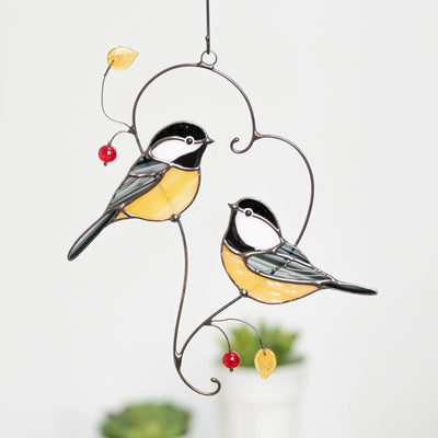 Stained glass chickadees sitting on the branch suncatcher