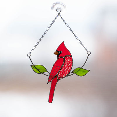 Stained glass cardinal sitting on the chain suncatcher