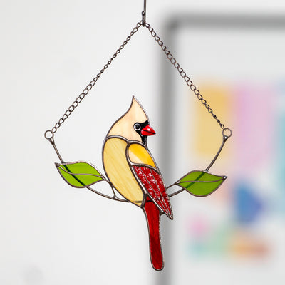Stained glass female cardinal sitting on the chain suncatcher