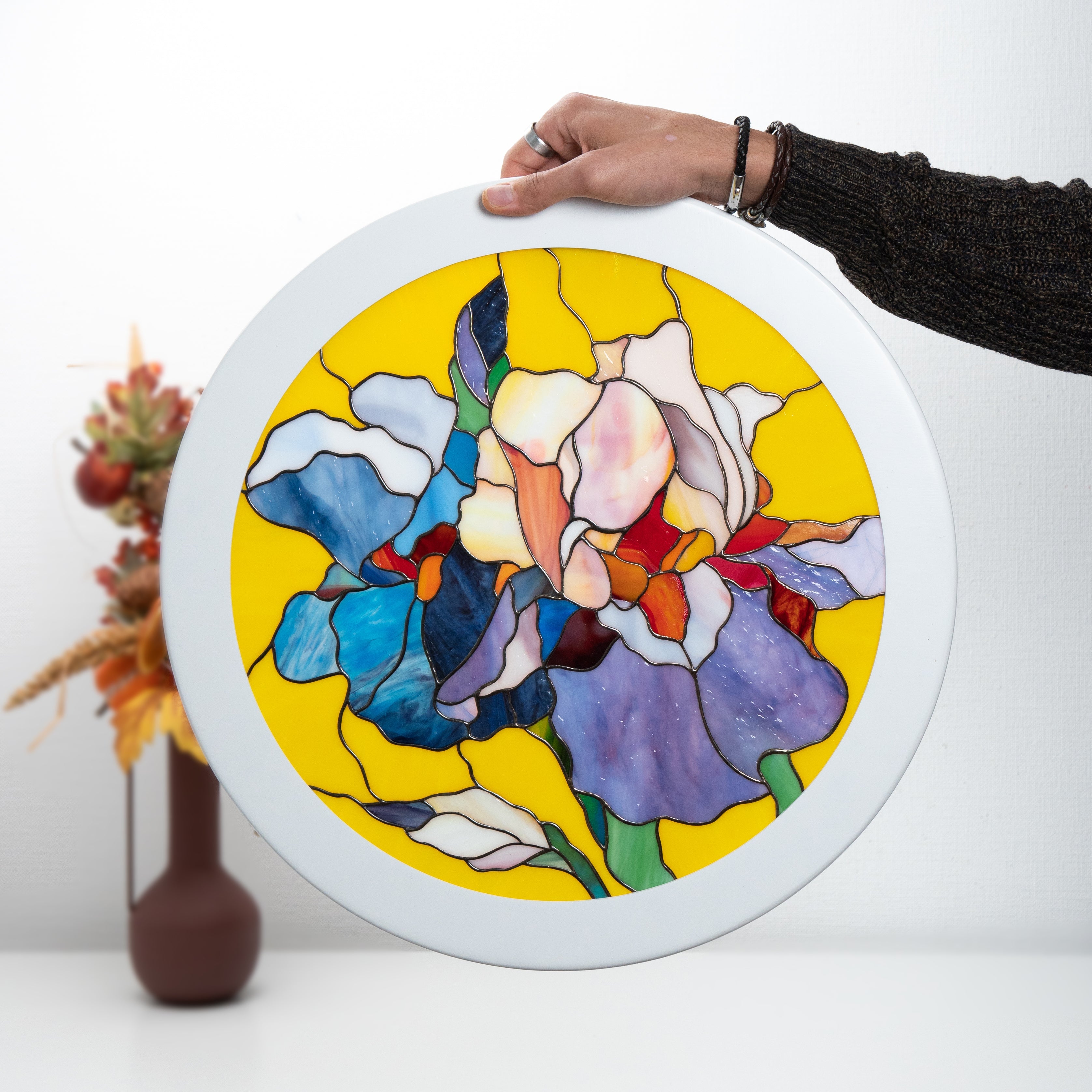 Round window panel depicting irises of stained glass 