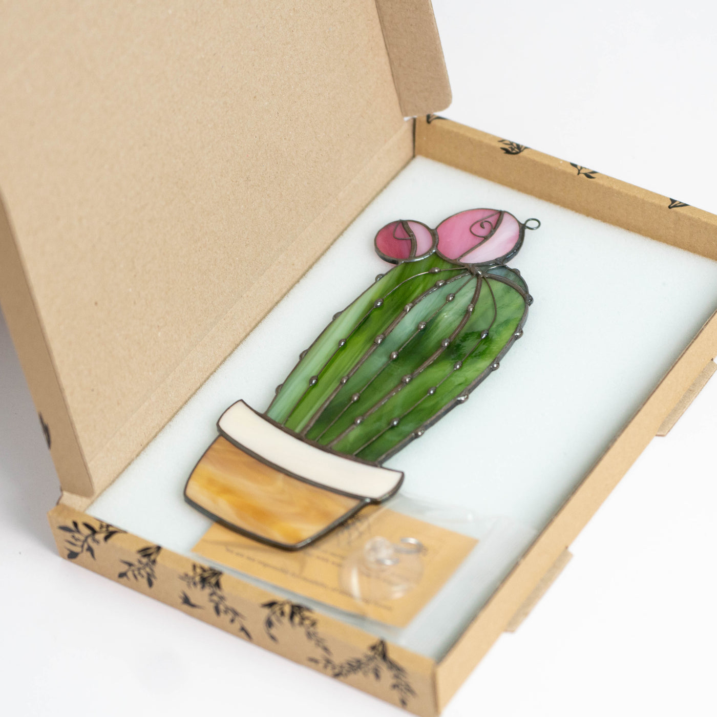 How stained glass cactus suncatcher is packed