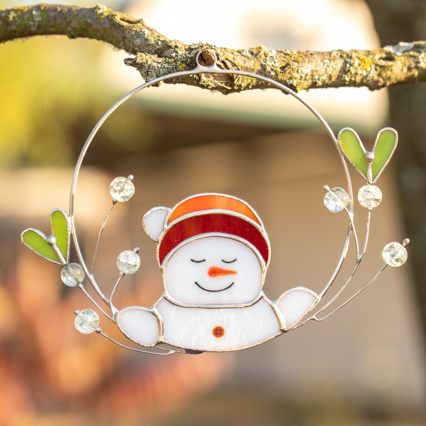 Snowman in mistletoe of stained glass window suncatcher for Christmas