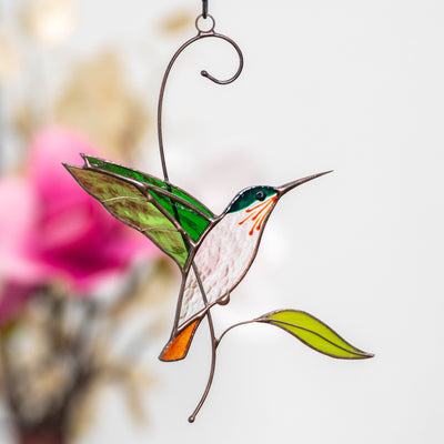 Flying green hummingbird suncatcher of stained glass