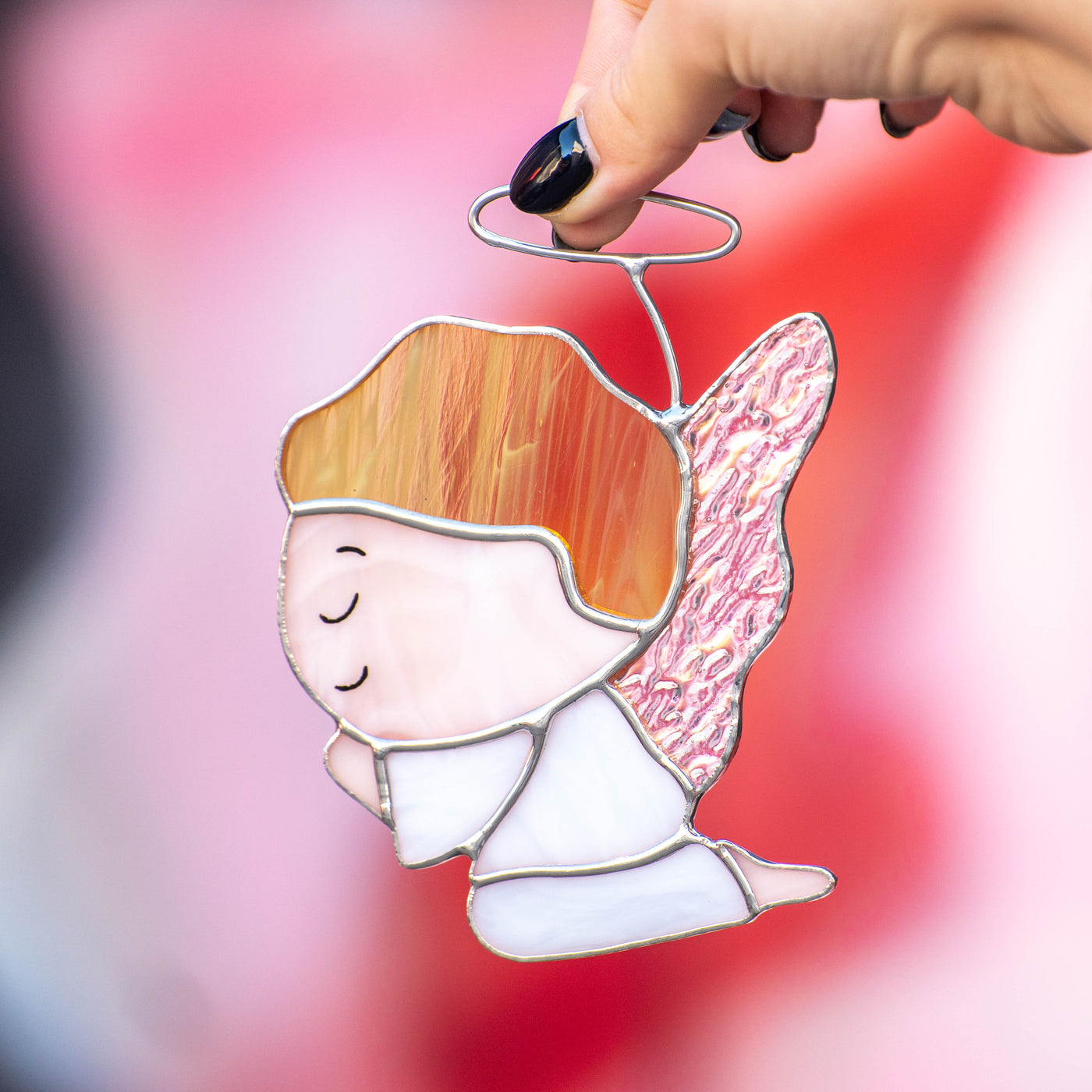 Praying angel boy suncatcher of stained glass for Christmas