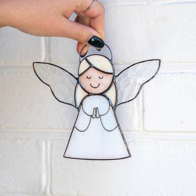 Angel girl praying of stained glass for Christmas window decor