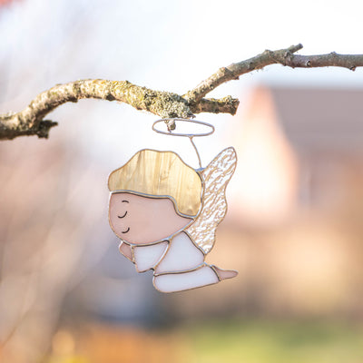 Praying angel boy window hanging of stained glass