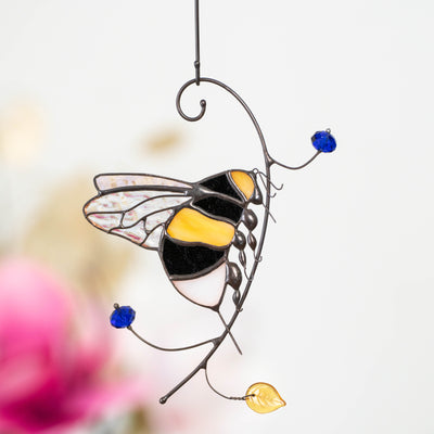 Stained glass handmade window hanging of a bumblebee with iridescent wings