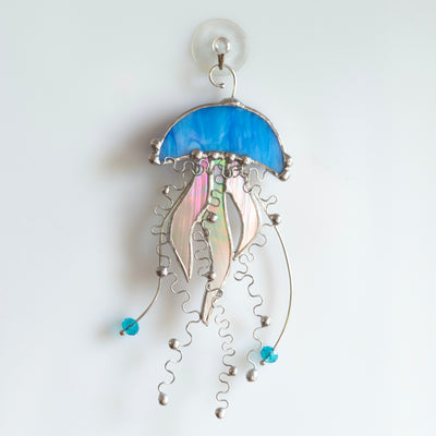 Blue stained glass jellyfish with iridescent tentacles suncatcher for window