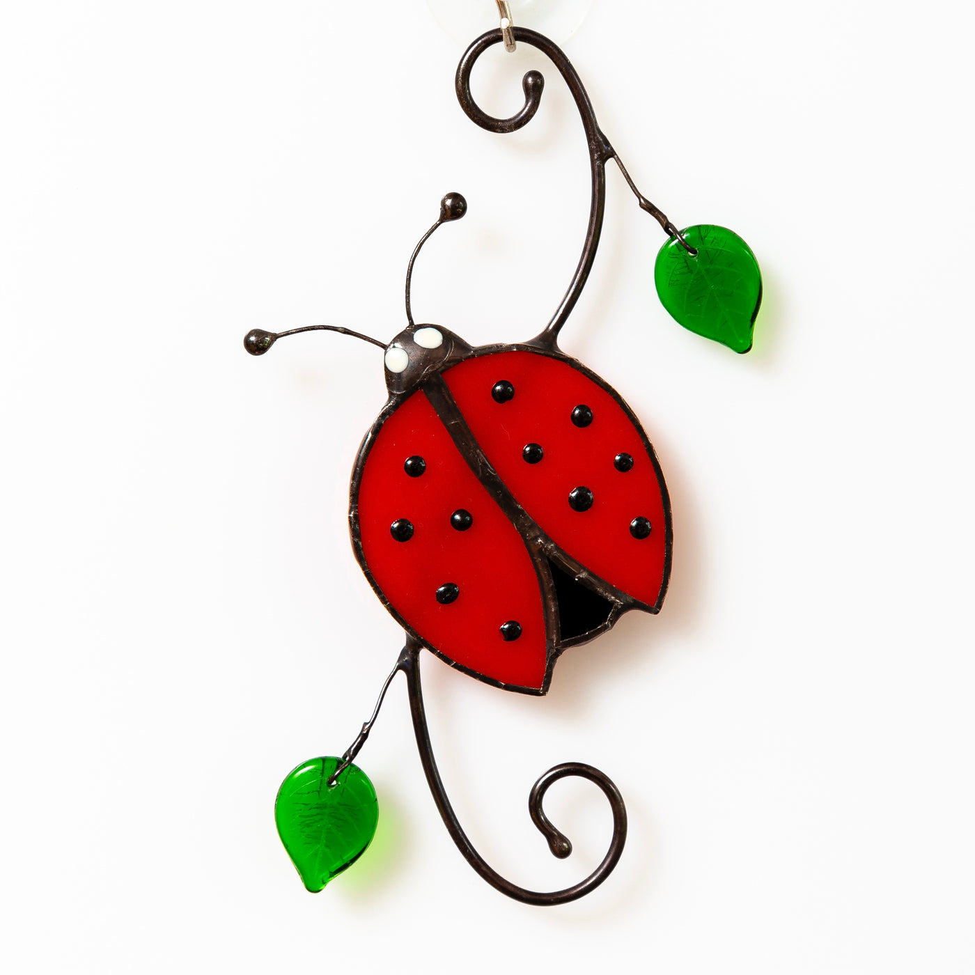 Suncatcher of a stained glass ladybug with leaves