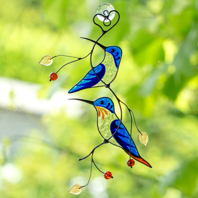 Two stained glass blue hummingbirds suncatcher