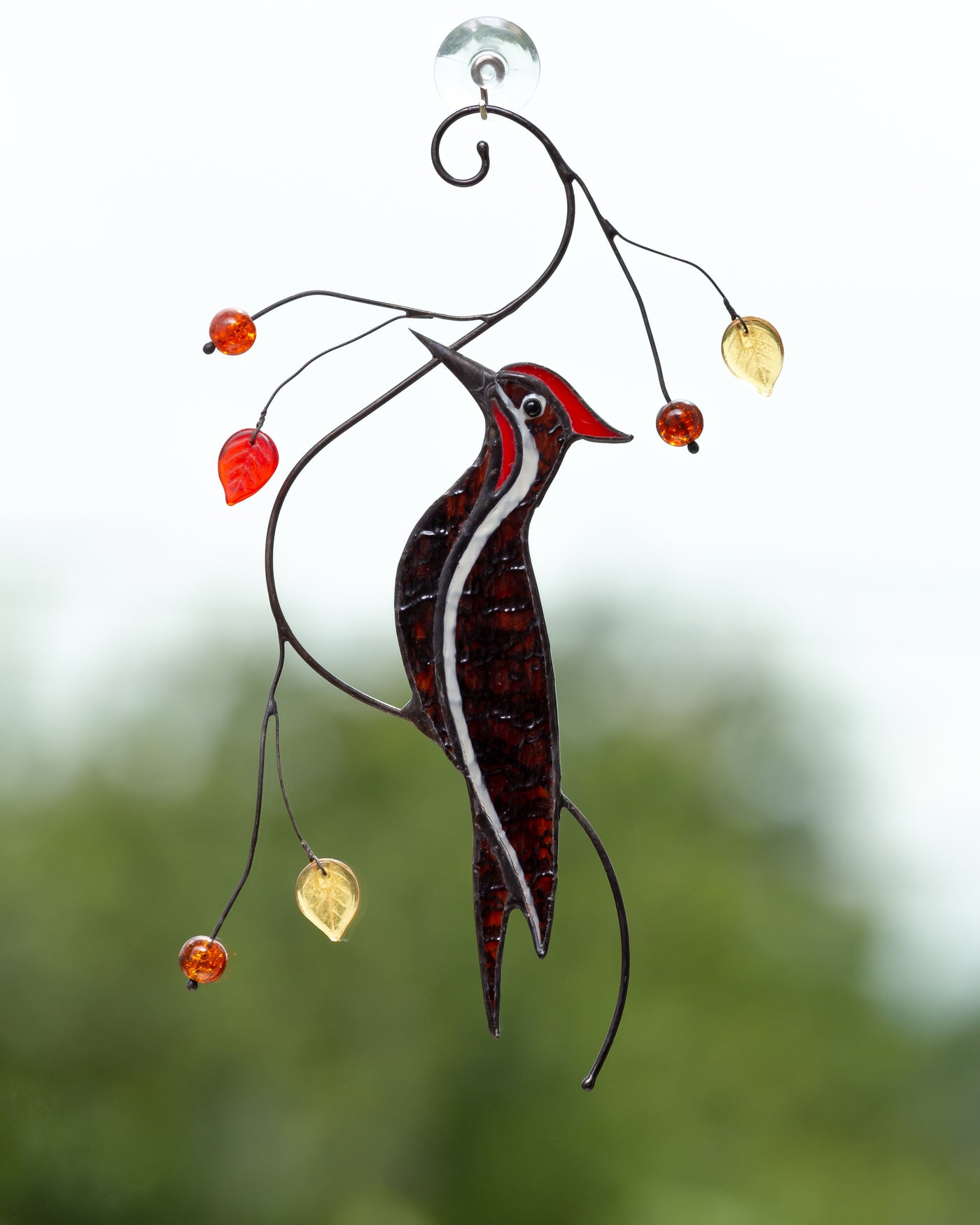 Pileated woodpecker on the branch stained glass suncatcher
